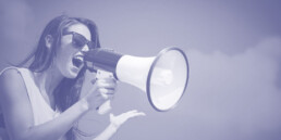 Woman using a megaphone