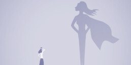 Woman looking at her huge silhouette