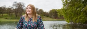 Hannah in front of lake