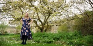 Hannah stood in front of a magnolia tree in blossom