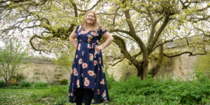 Hannah stood in front of a magnolia tree in blossom